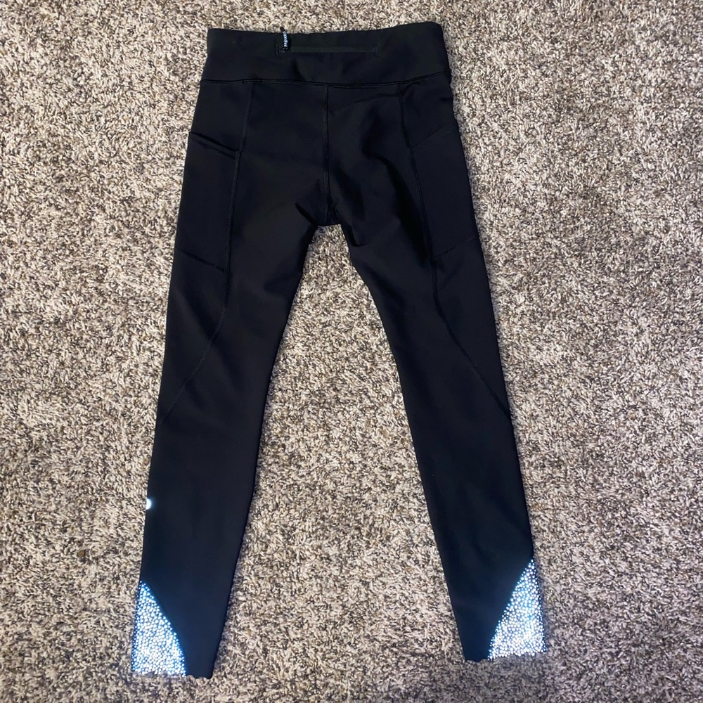 Lululemon black leggings size 4